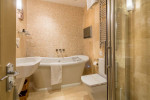 Rolltop bath with TV in Room 4, Somerville Suite